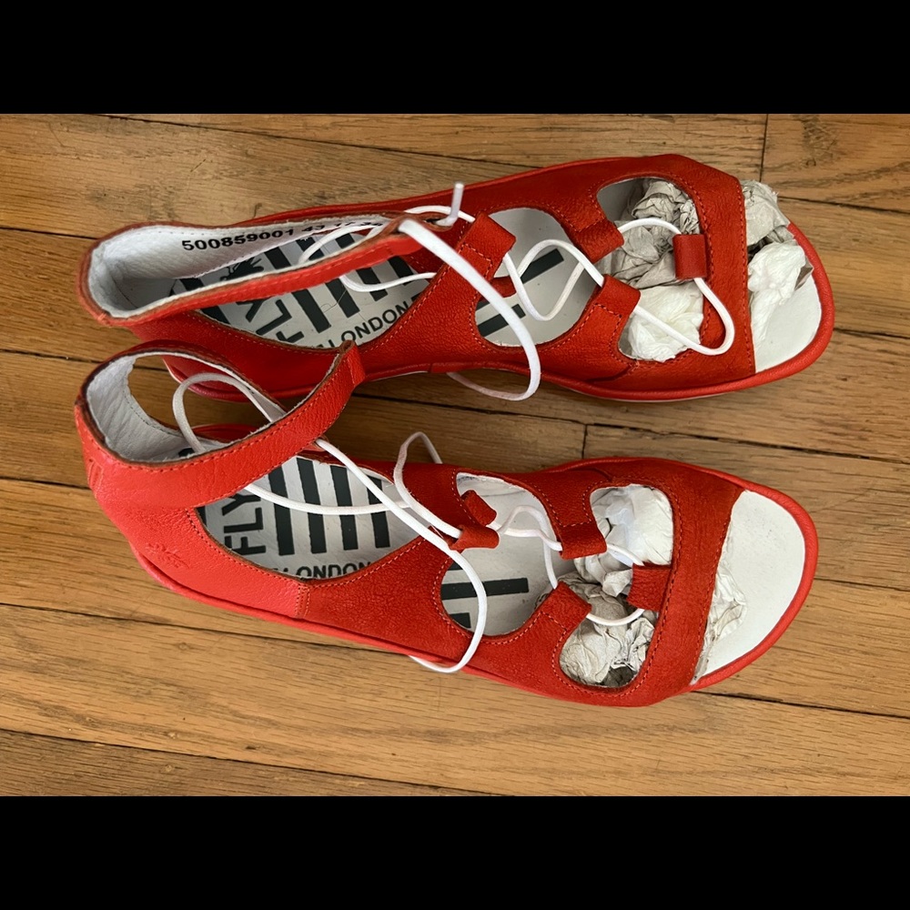 Fly London orange lace-up sandals